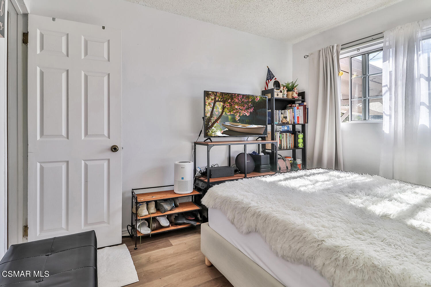 1776 Cochran Street Simi Valley, CA 93065 - Photo 19 of 43 a bedroom with a bed and a window