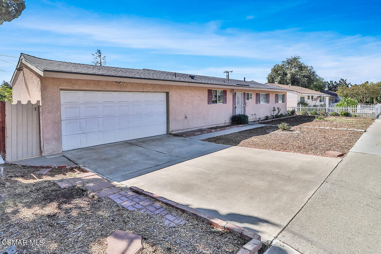 1776 Cochran Street Simi Valley, CA 93065 - Photo 2 of 43 a front view of a house with a yard