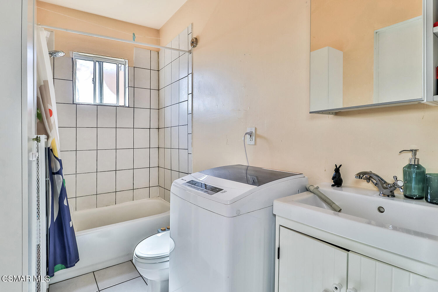 1776 Cochran Street Simi Valley, CA 93065 - Photo 29 of 43 a bathroom with a sink a toilet and shower