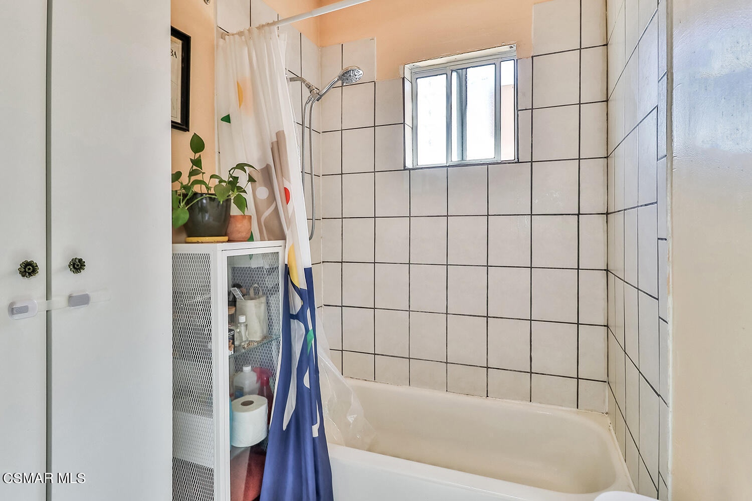 1776 Cochran Street Simi Valley, CA 93065 - Photo 30 of 43 a bathroom with a bathtub and shower