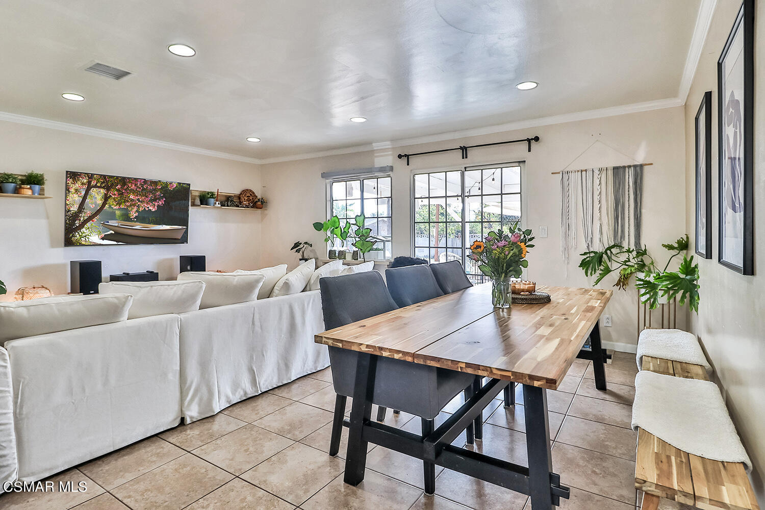 1776 Cochran Street Simi Valley, CA 93065 - Photo 10 of 43 a view of a dining room with furniture a livingroom and chandelier