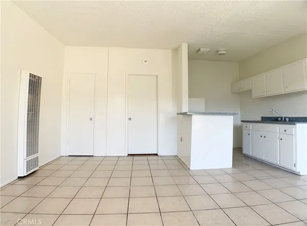 a view of a kitchen with a sink