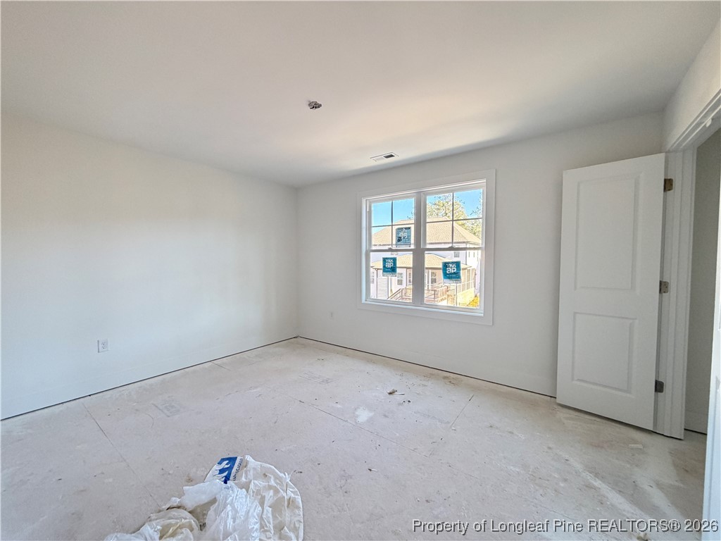 96 Graduate Ct Spring Lake Spring Lake, NC 28390 - Photo 13 of 33 an empty room with windows