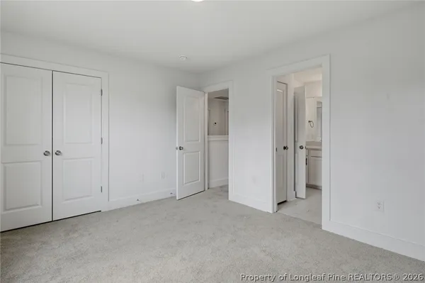 an aerial view of a house with a yard swimming pool and outdoor seating