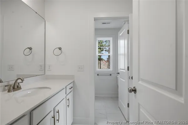 a view of a backyard of the house