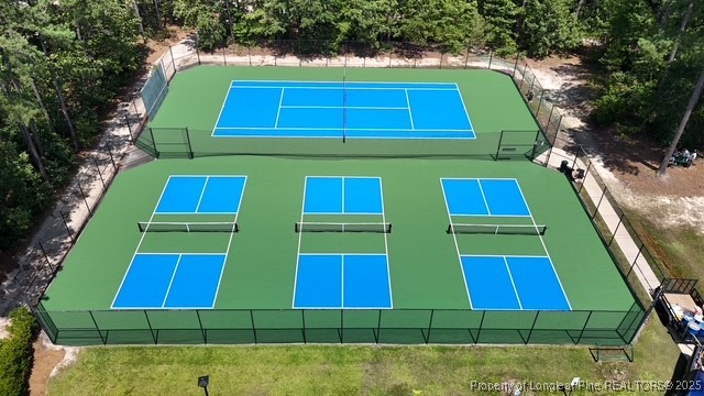 96 Graduate Ct Spring Lake Spring Lake, NC 28390 - Photo 40 of 49 a green building sitting in front of a yard