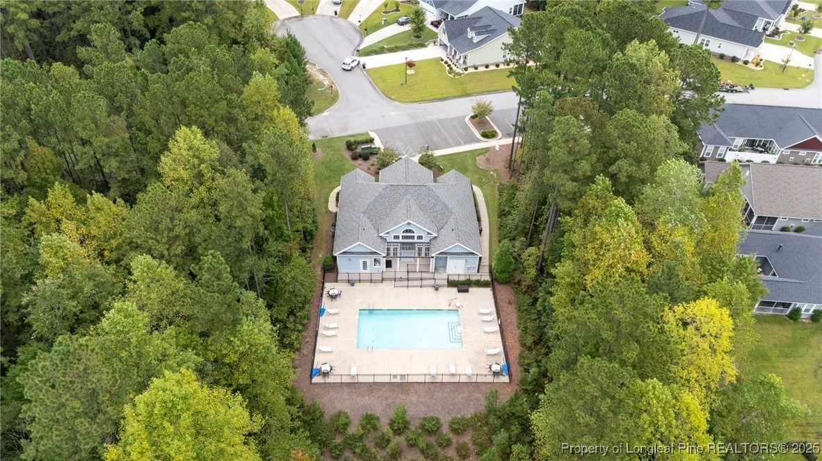 96 Graduate Ct Spring Lake Spring Lake, NC 28390 - Photo 41 of 49 an aerial view of a house with a yard swimming pool and outdoor seating