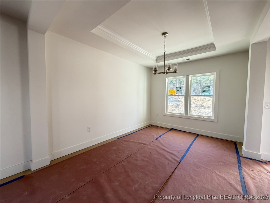 96 Graduate Ct Spring Lake Spring Lake, NC 28390 - Photo 5 of 33 a view of an empty room with window and chandelier