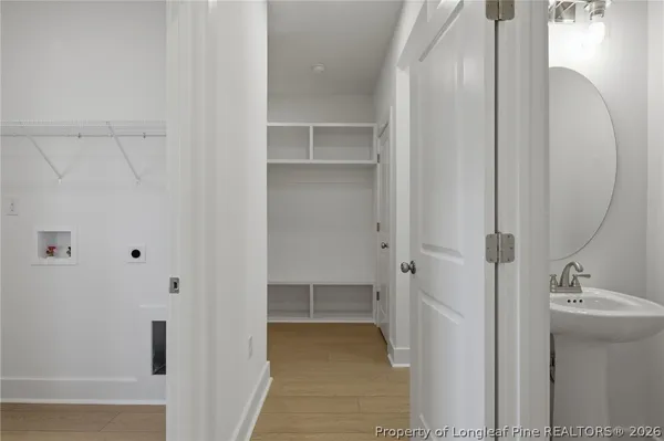 an empty room with a ceiling fan and a ceiling fan