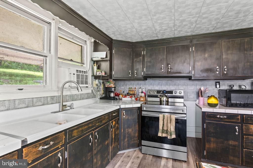 1644 Moselem Spring Road Hamburg, PA 19526 - Photo 14 of 26 Charming kitchen with modern flair.