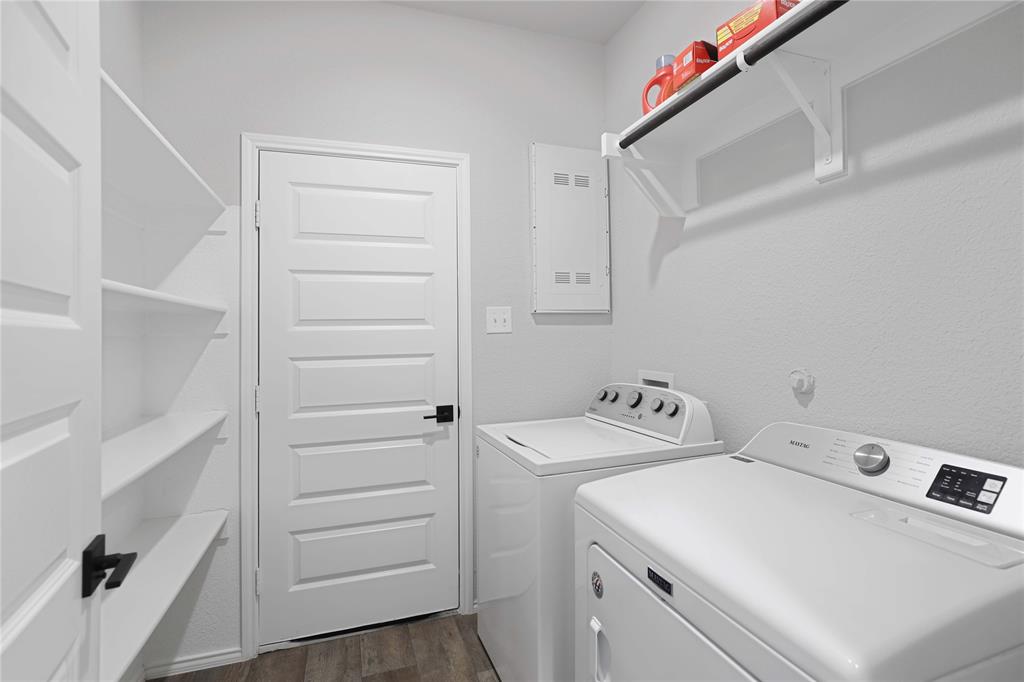 813 Williams Way Van Alstyne, TX 75495 - Photo 21 of 27 a utility room with dryer and washer