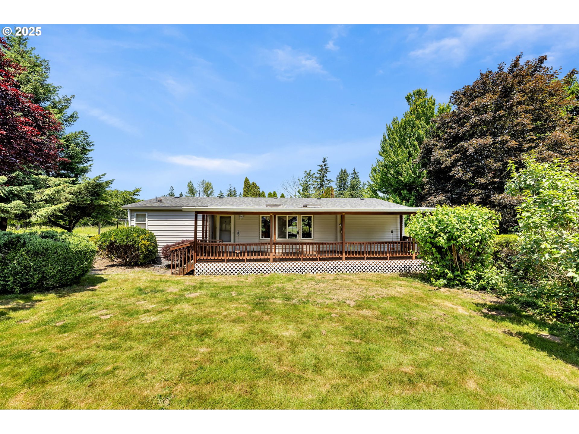 1900 Northeast 194th Street Ridgefield, WA 98642 - Photo 1 of 1 a view of a house with pool and a yard