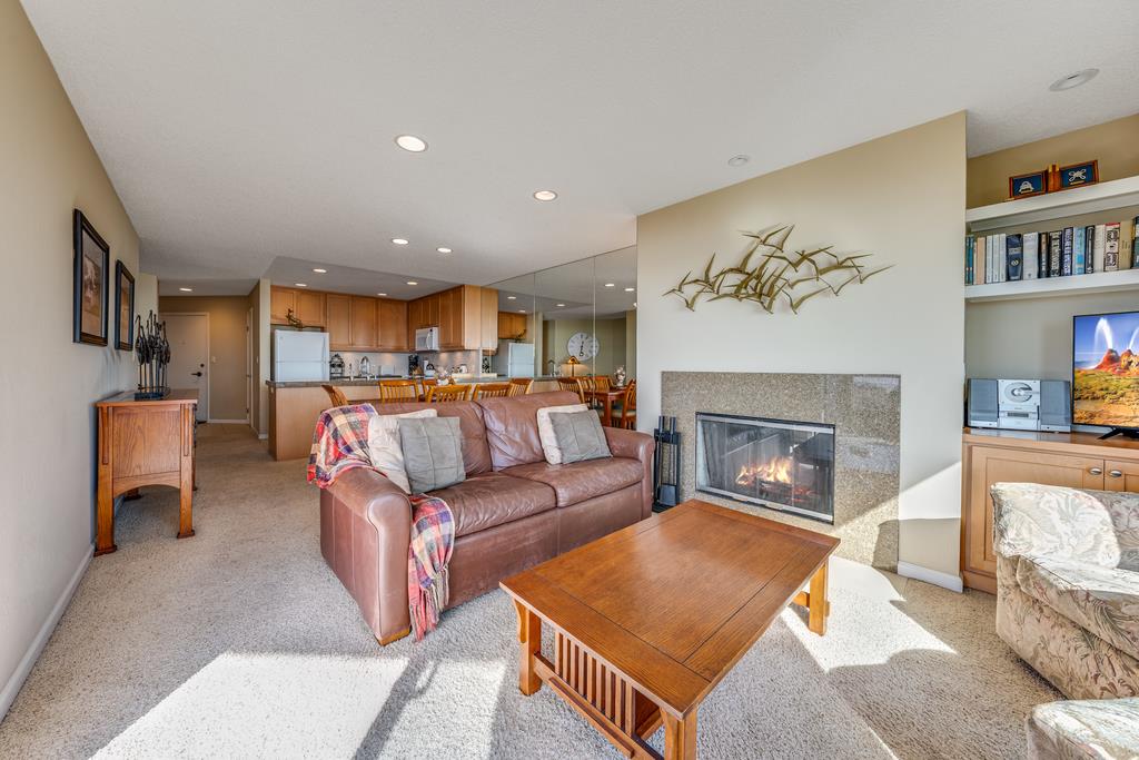 101 Shell Road, Unit 290 Watsonville, CA 95076 - Photo 10 of 26 a living room with furniture and a fireplace