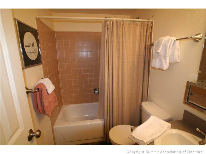 520 Bills Ranch Road, Unit 343 Frisco, CO 80443 - Photo 5 of 21 a bathroom with a shower a toilet and a sink