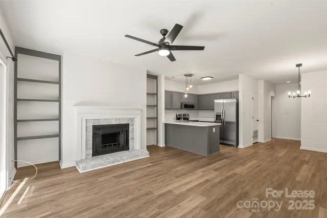a view of a kitchen with a sink and a kitchen