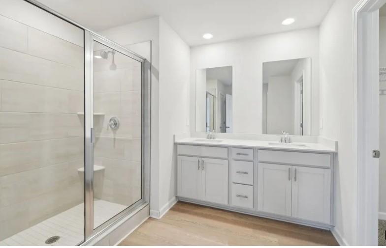2850 Aralynn Way College Park, GA 30337 - Photo 6 of 9 a bathroom with a double vanity sink mirror and shower