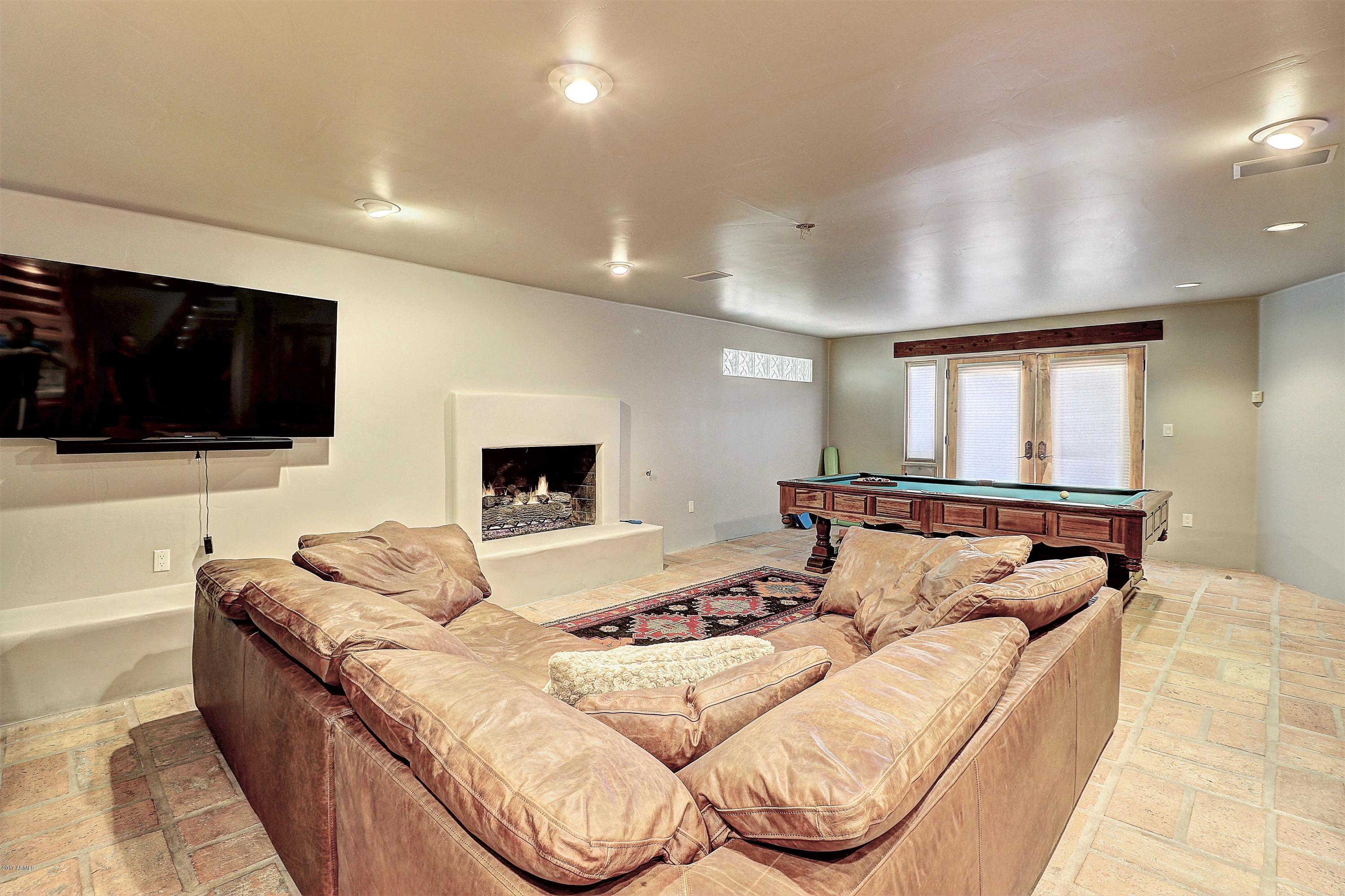 6107 East Quartz Mountain Road Paradise Valley, AZ 85253 - Photo 18 of 63 Game room w/ fireplace