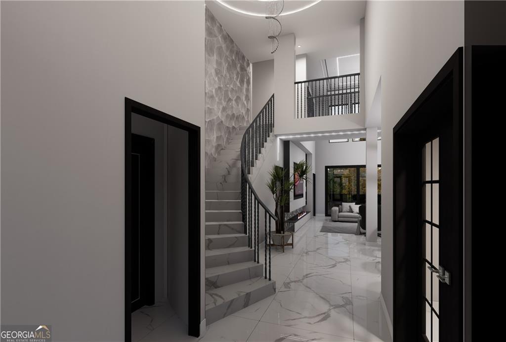 5016 Colton Run Atlanta, GA 30349 - Photo 5 of 31 a view of entryway and hall with dining room