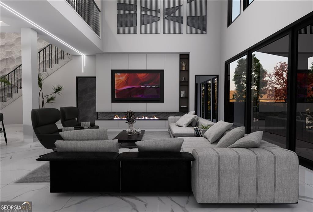 5016 Colton Run Atlanta, GA 30349 - Photo 7 of 31 a living room with furniture and a flat screen tv