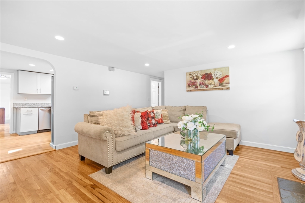 27 Ward Well Road Canton, MA 02021 - Photo 11 of 33 a living room with furniture and wooden floor