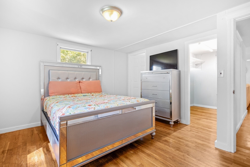 27 Ward Well Road Canton, MA 02021 - Photo 15 of 33 a bedroom with a bed and a dresser
