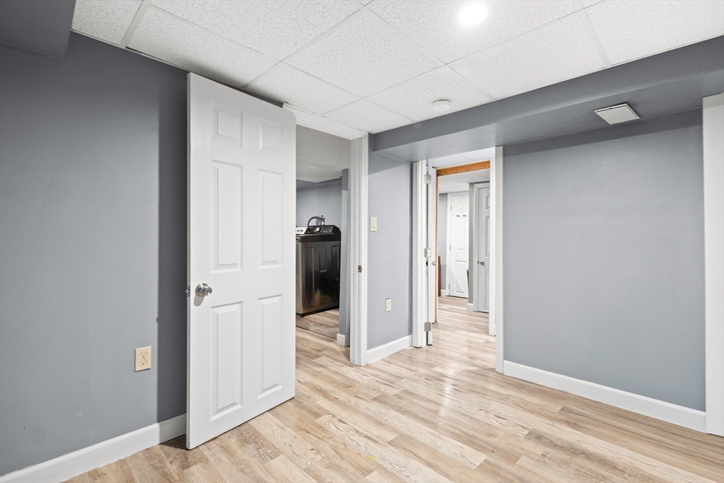 27 Ward Well Road Canton, MA 02021 - Photo 20 of 33 wooden floor in an empty room