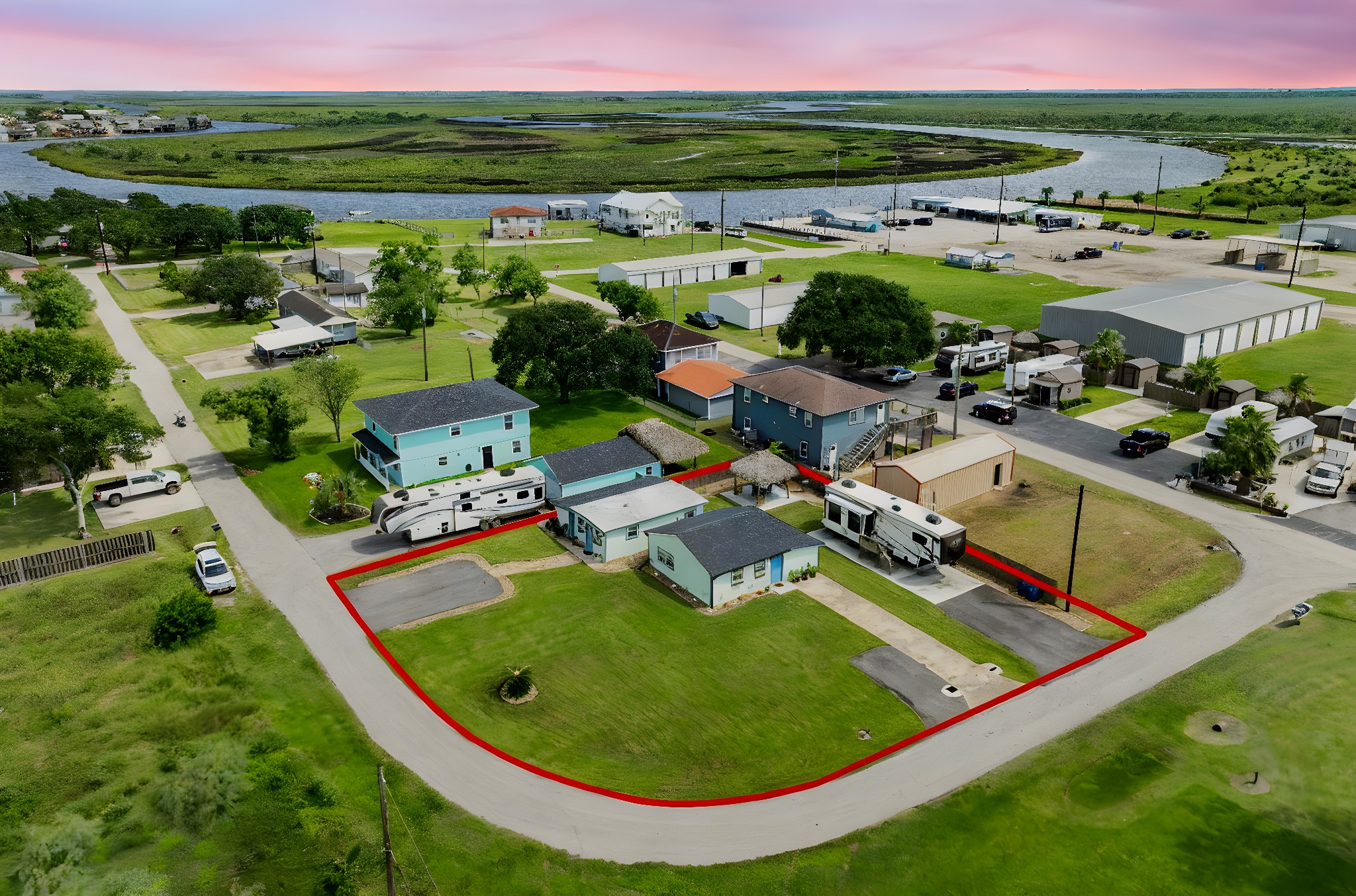 an aerial view of a house with a garden