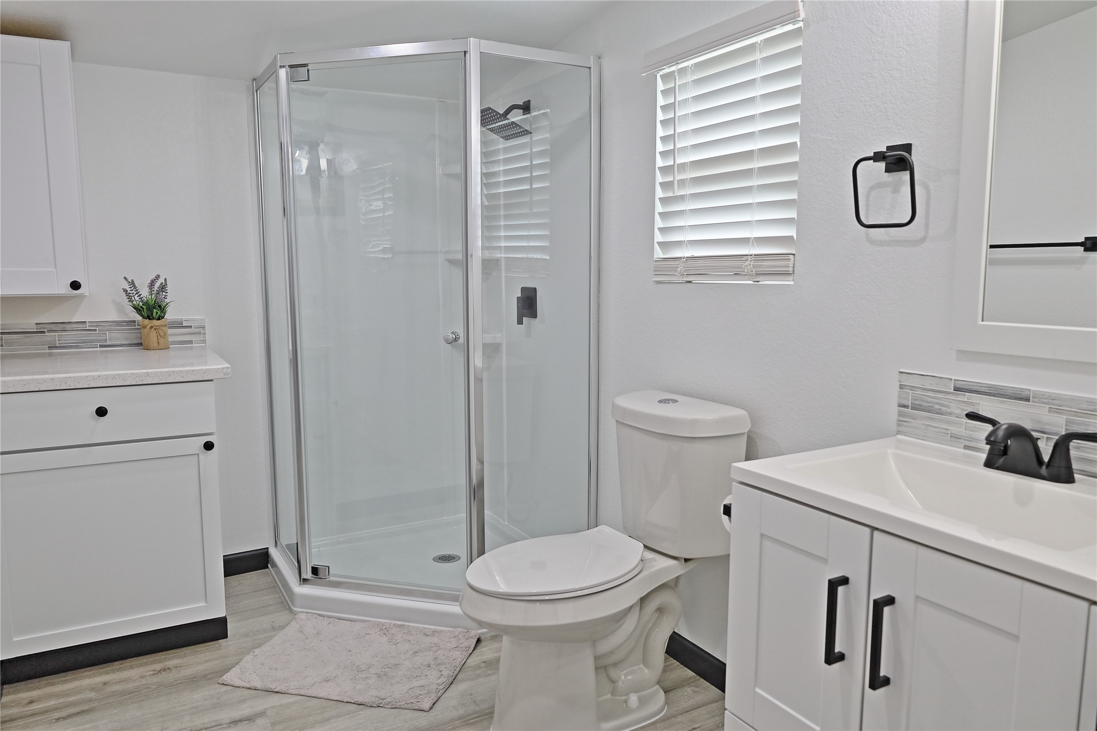 4402 Zelsky Road Freeport, TX 77541 - Photo 9 of 37 a bathroom with a sink a toilet and shower