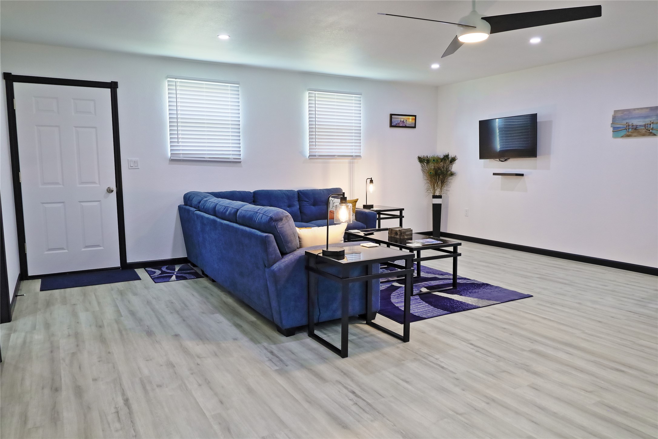 4402 Zelsky Road Freeport, TX 77541 - Photo 13 of 37 a living room with furniture and a flat screen tv