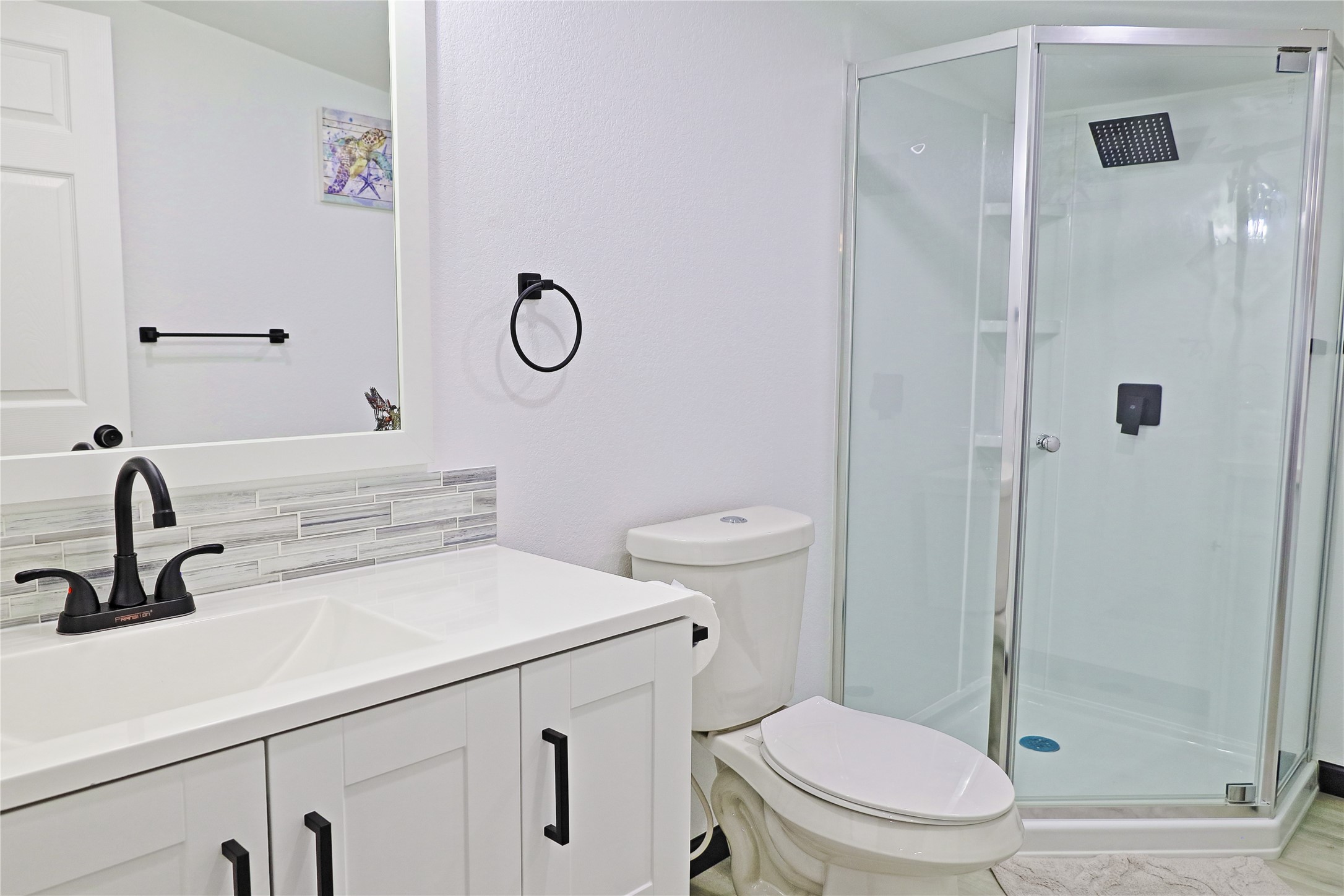 4402 Zelsky Road Freeport, TX 77541 - Photo 21 of 37 a bathroom with a sink a toilet and shower