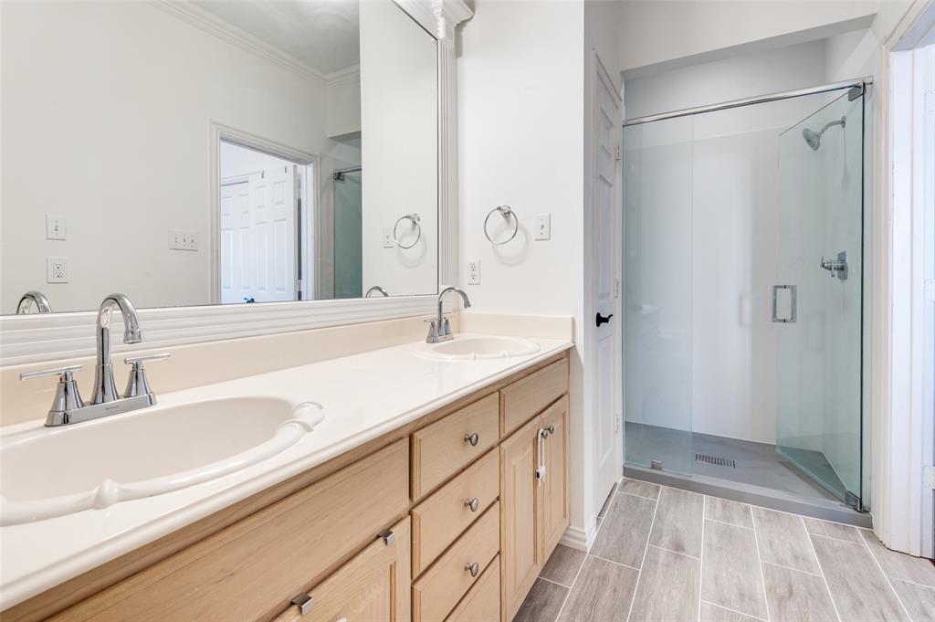 2505 Corbeau Drive Irving, TX 75038 - Photo 22 of 25 Primary bath also includes a separate shower.