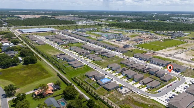 swimming pool view with a lake view
