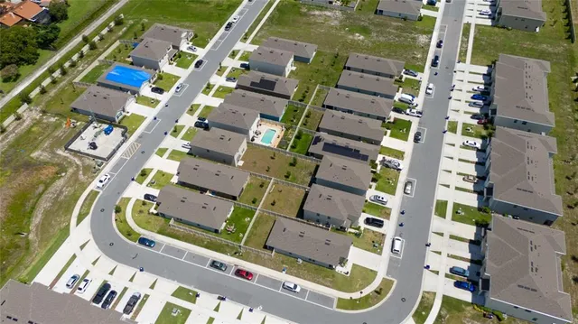 an aerial view of a swimming pool