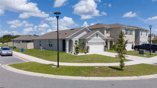 a view of kitchen with furniture and a potted plant