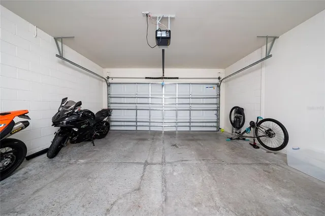 a view of a house with backyard and garden