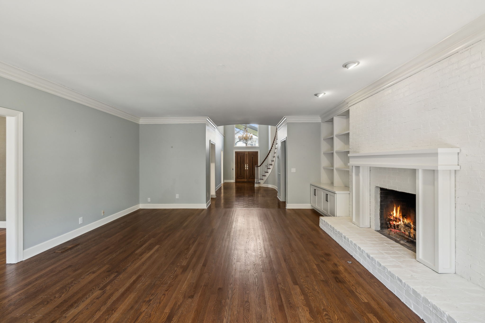 29 Washington Park Nashville, TN 37205 - Photo 16 of 60 a view of an empty room with wooden floor fireplace and a window