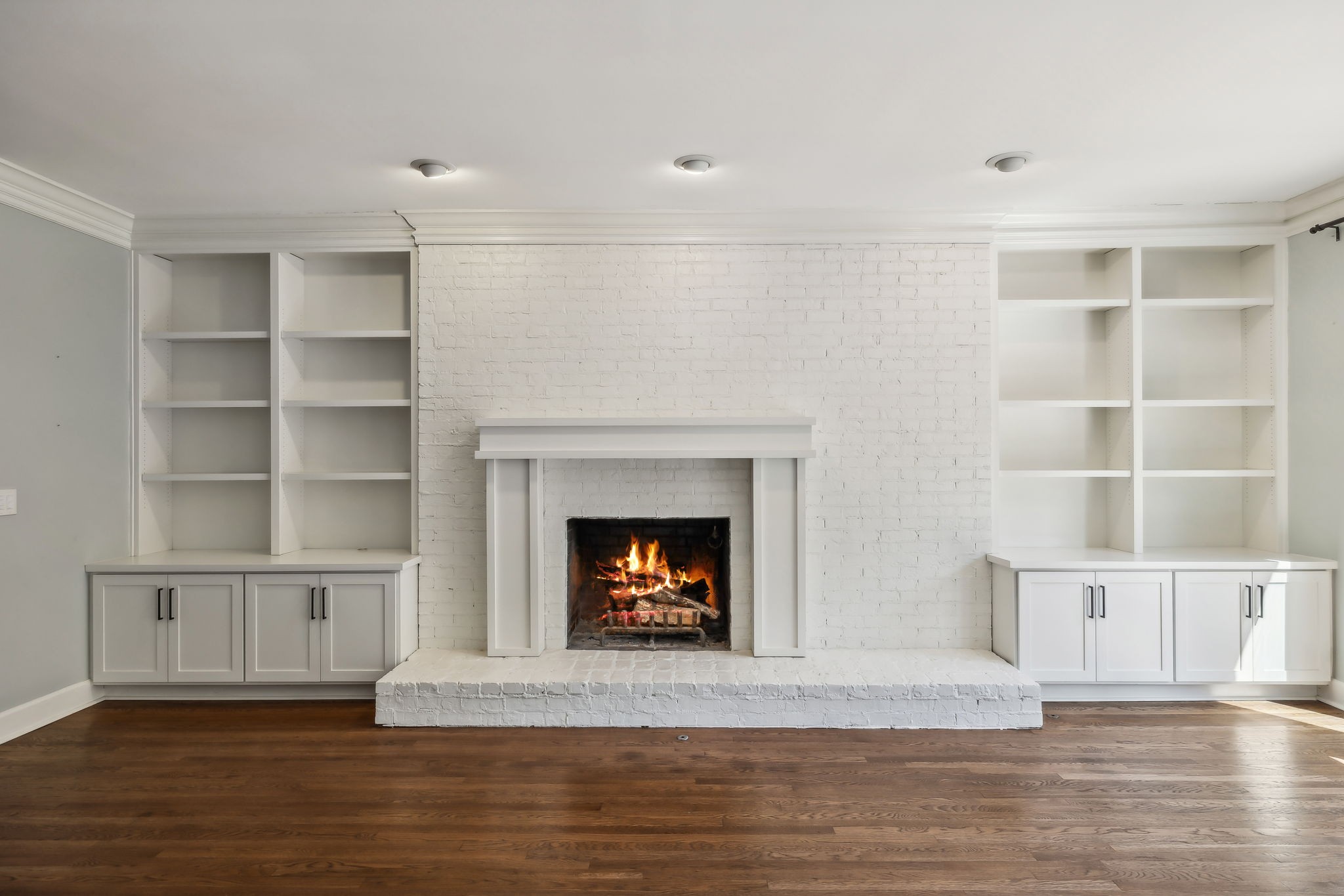 29 Washington Park Nashville, TN 37205 - Photo 17 of 60 a living room with a fireplace and a wooden floor