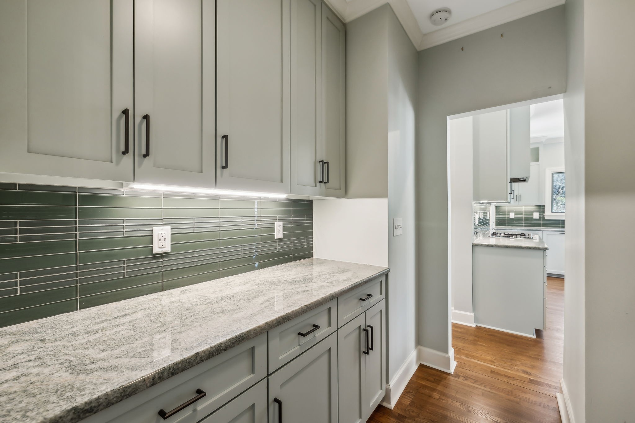 29 Washington Park Nashville, TN 37205 - Photo 21 of 60 a kitchen with granite countertop white cabinets and white appliances