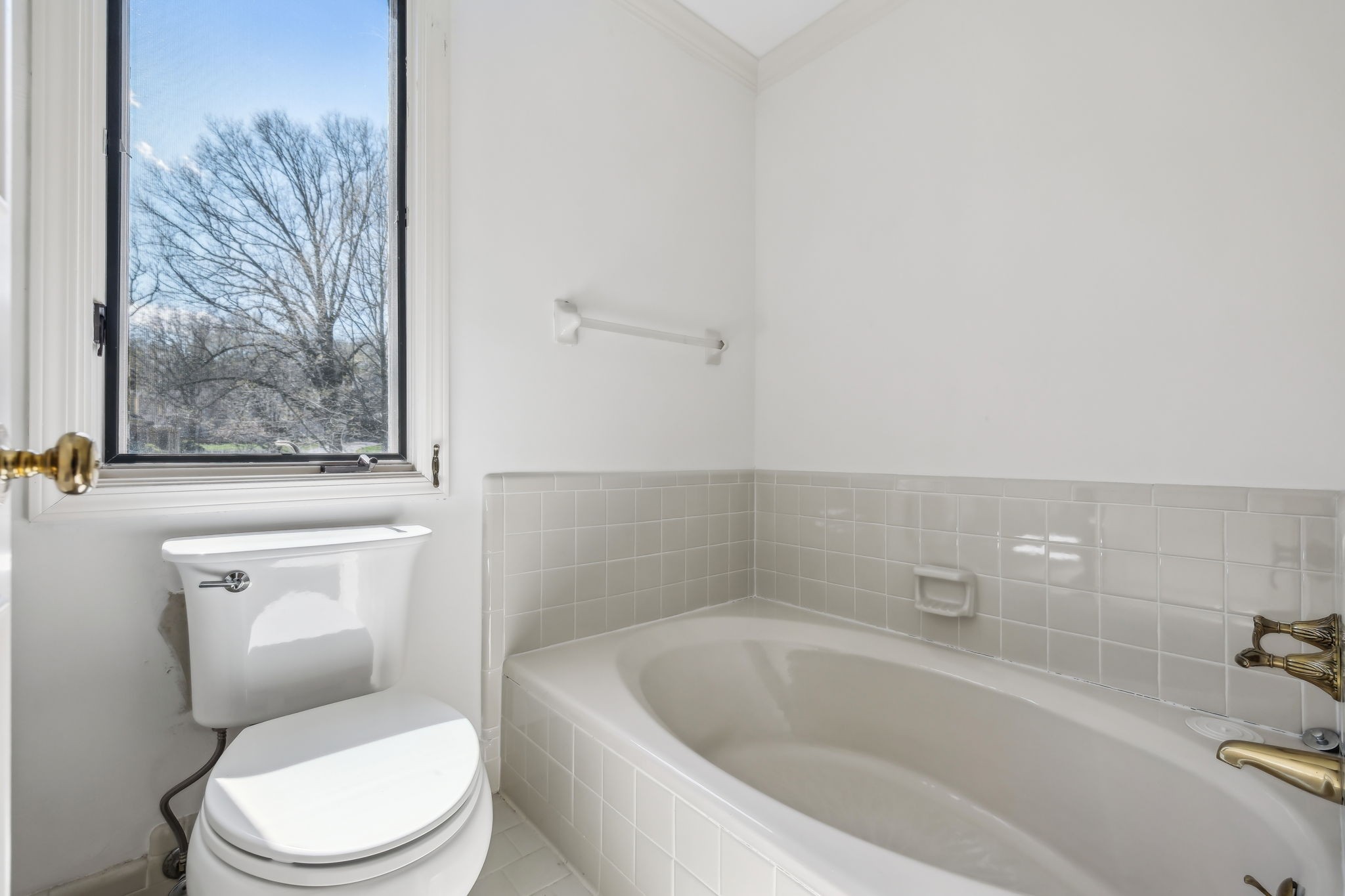 29 Washington Park Nashville, TN 37205 - Photo 33 of 60 a white toilet sitting next to a bath tub