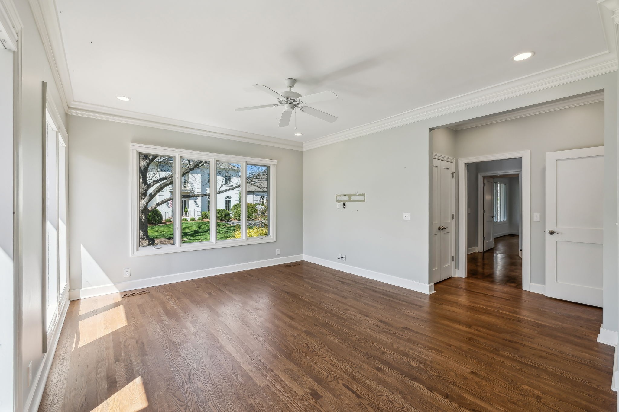 29 Washington Park Nashville, TN 37205 - Photo 8 of 60 a view of an empty room with wooden floor and a window