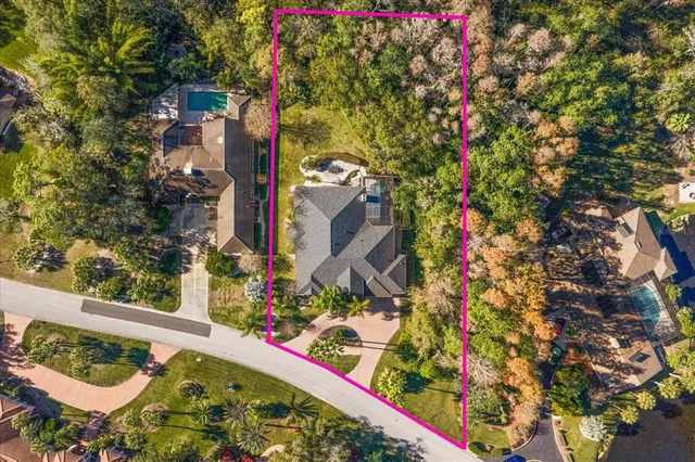 an aerial view of city and lake