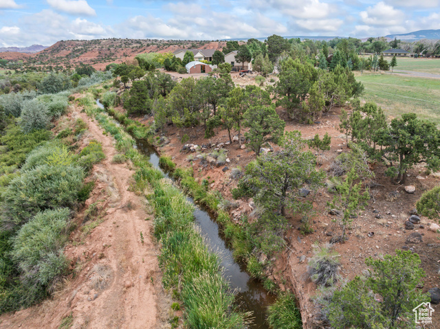 169 East 370 North Torrey, UT 84775 - Photo 20 of 23 Aerial view of property and surrounding area with a mountainous background and rural landscape