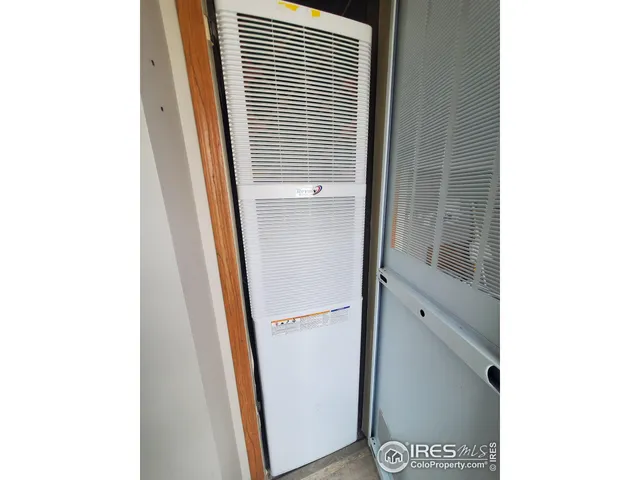 a bathroom with a shower and a door