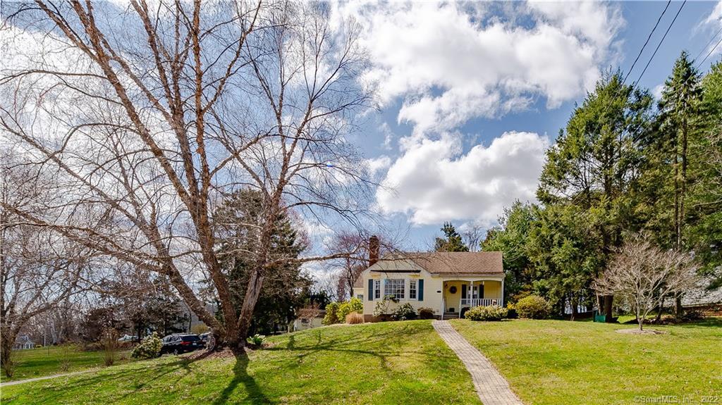 The home is set back from the road and has wonderful curb appeal.