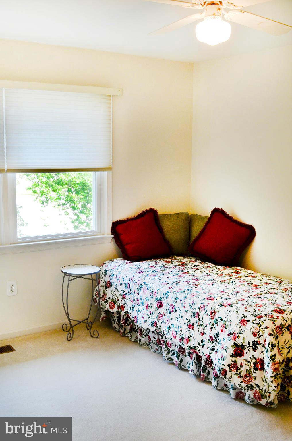 9200 Rockefeller Lane Springfield, VA 22153 - Photo 22 of 30 a bedroom with a bed and window