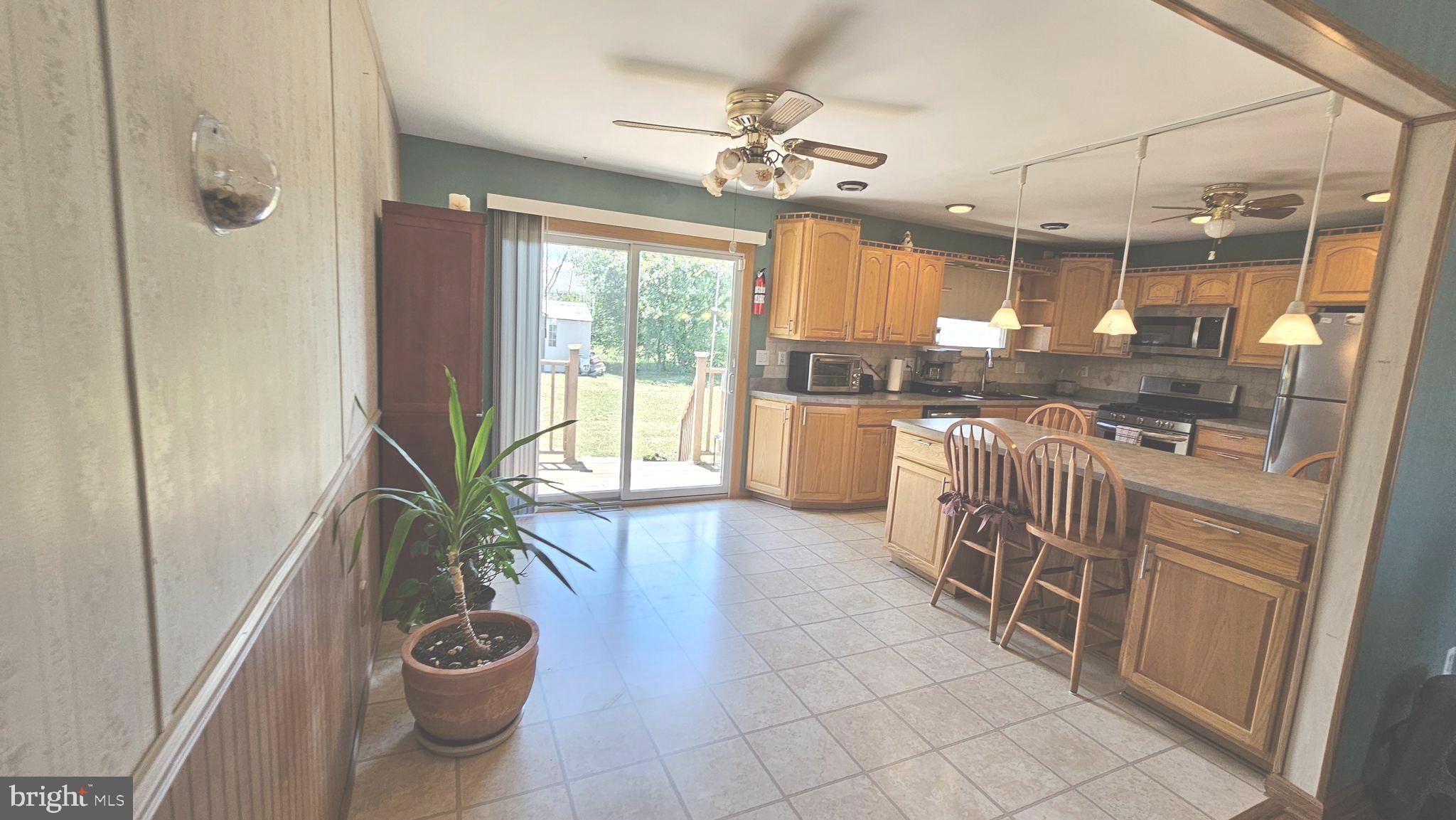 125 Colonial Road Edgewater Park, NJ 08010 - Photo 22 of 43 Eat-In Area of Kitchen and back sliding door