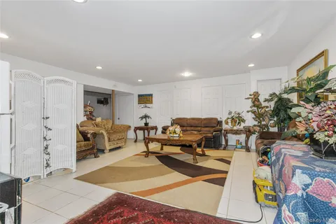 a view of a backyard with a garden and plants
