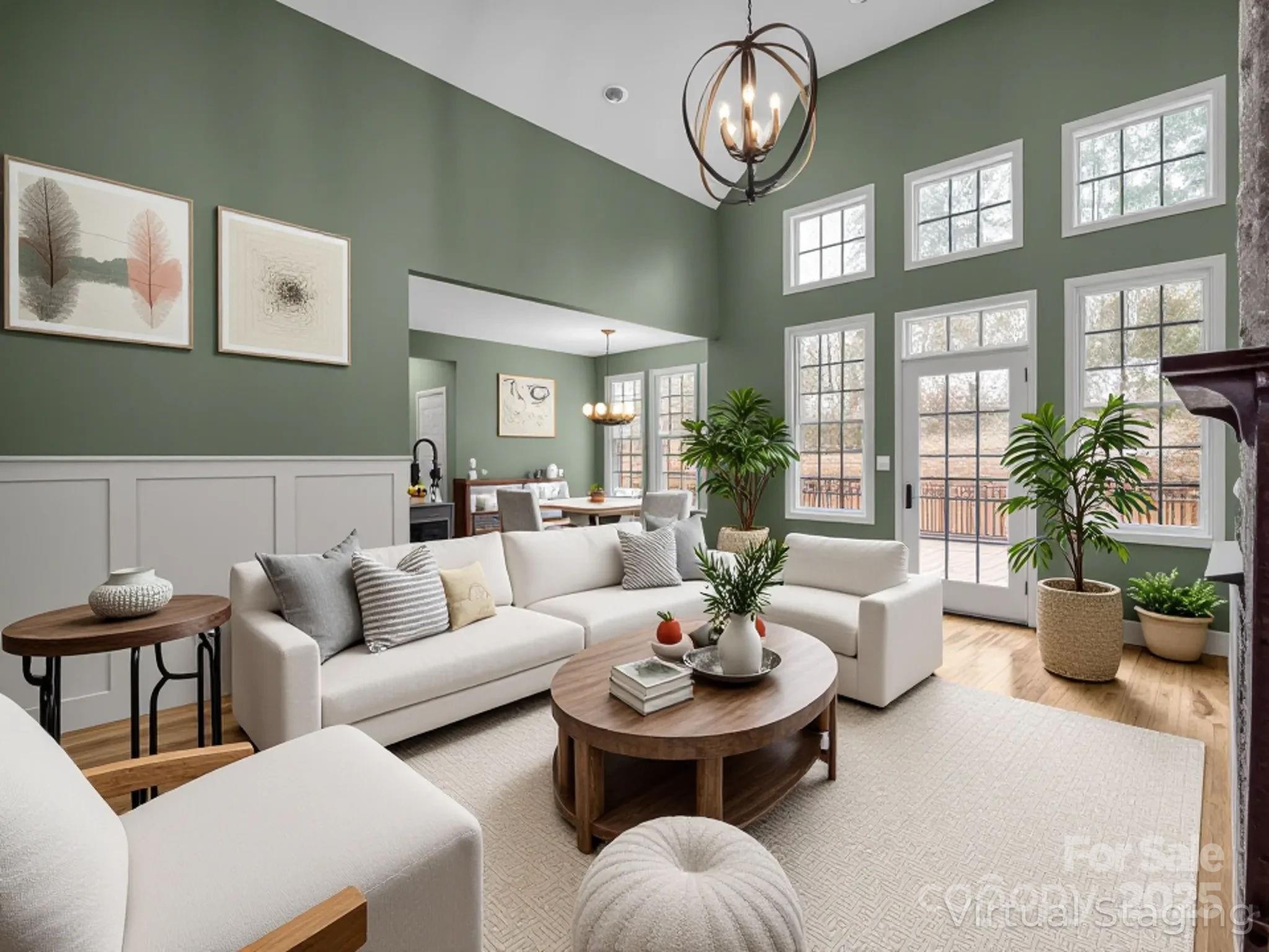 351 East Rambling Creek Drive Tryon, NC 28782 - Photo 3 of 48 a living room with furniture flower and a large window