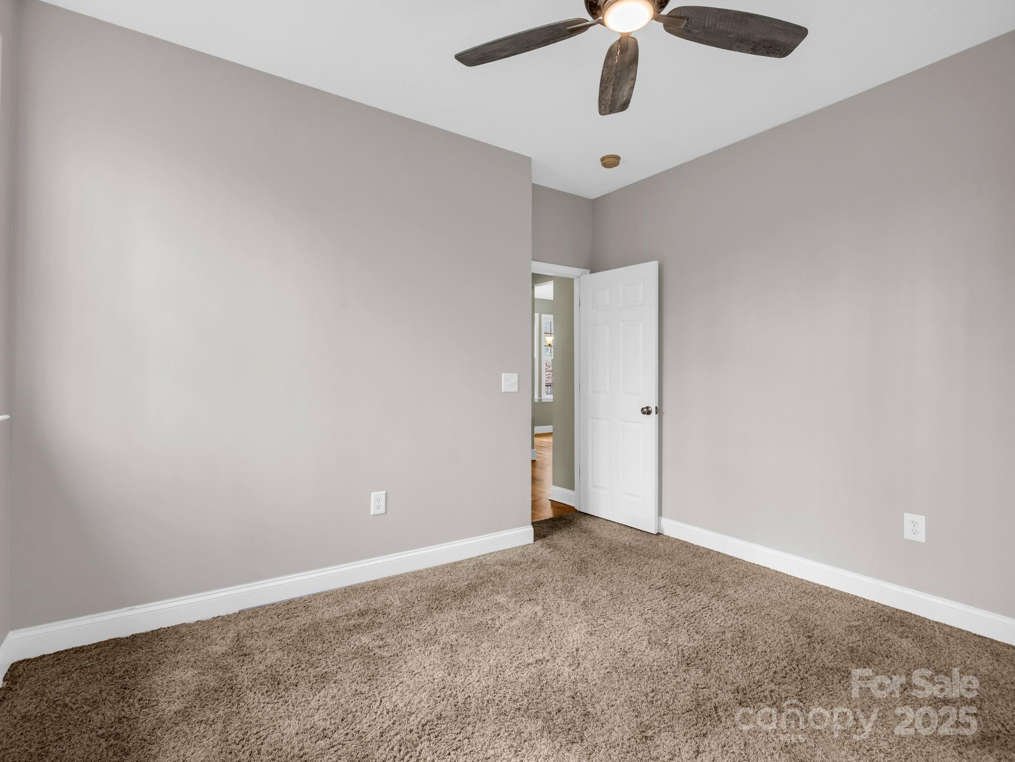 351 East Rambling Creek Drive Tryon, NC 28782 - Photo 31 of 48 an empty room with chandelier fan