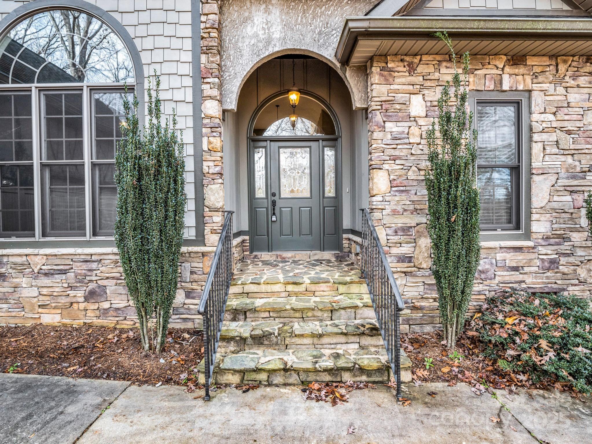 351 East Rambling Creek Drive Tryon, NC 28782 - Photo 41 of 48 a view of entrance gate of a house